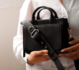 MINI VOYAGER SLING BAG