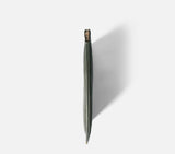 Side profile of the Olive Green Muse Women Clutch Bag, highlighting the sturdy structure that keeps your essentials safe without adding bulk.