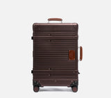 Cacao brown hardshell suitcase front view with premium leather details wheeled travel bag for international flights