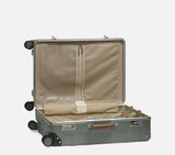 Wingman hardshell luggage open interior showing mesh dividers, compression straps & beige fabric lining inside