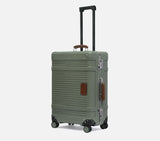 Vintage-style Wingman fern green hardshell suitcase with leather handles, TSA lock, and spinner wheels for luxury travel