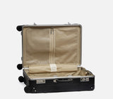 Wingman slate black check in suitcase open interior showing organized compartments, straps & large capacity for travel
