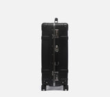 Wingman slate black trolley suitcase side profile with 4-wheel spinner system, TSA lock & sleek minimal design