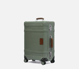 Fern Green Wingman hardshell trolley suitcase with brown leather handle, 4-spinner wheels, TSA locks & vintage trunk style