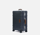 Perspective view of the Midnight Blue spinner suitcase, showcasing its large capacity and premium design for business professionals.