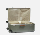 wingman fern green suitcase with TSA lock. This durable trunk box features a mesh divider, ideal for a 2 week vacation