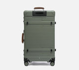 Back of a wingman trunk green luggage travel bag. This durable hardshell suitcase is the best spinner suitcase for business travel