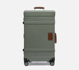 Wingman trunk green hardshell suitcase and premium luggage. A durable travel trunk for business travel with a spinner wheel set