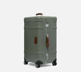 Wingman trunk green suitcase and luggage. A durable travel trunk for business travel with a spinner wheel set