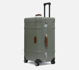 wingman trunk green trolley travel bag with extended handle. This hardshell spinner suitcase is the best luxury trolley bag for men