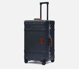wingman suitcase with extended telescopic handle. Premium spinner travel luggage for professional business travel.