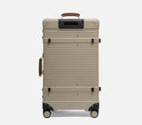 Back of a wingman sand luggage travel bag. This durable hardshell suitcase is the best spinner suitcase for business travel