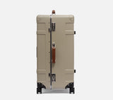 side view of a wingman sand hardshell suitcase with TSA lock. This durable luggage is a premium choice for international travel.