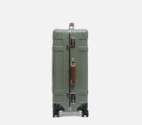 Side view of Fern Green Wingman hardshell suitcase 26cm depth expandable polycarbonate wheeled travel bag with smooth gliding spinner wheels