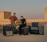 Wingman collction of luggage sets suitcases and luxury trolley bags in Slate Black, Midnight Blue, Fern Green, Desert Sand and Cacao Brown.